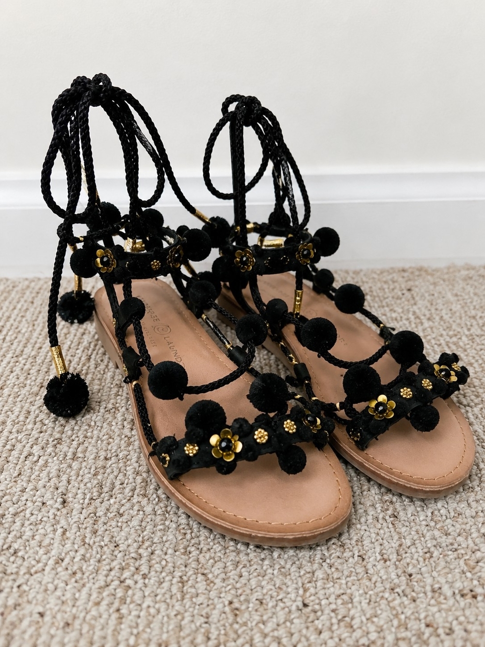 Chinese Laundry Black Pom-Pom Lace-Up Sandals with Gold Accents